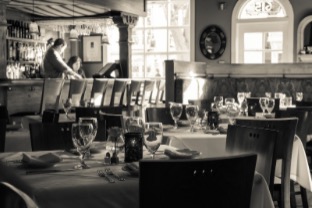 black and white image of interior dining room; click image to view gallery of restaurant photos